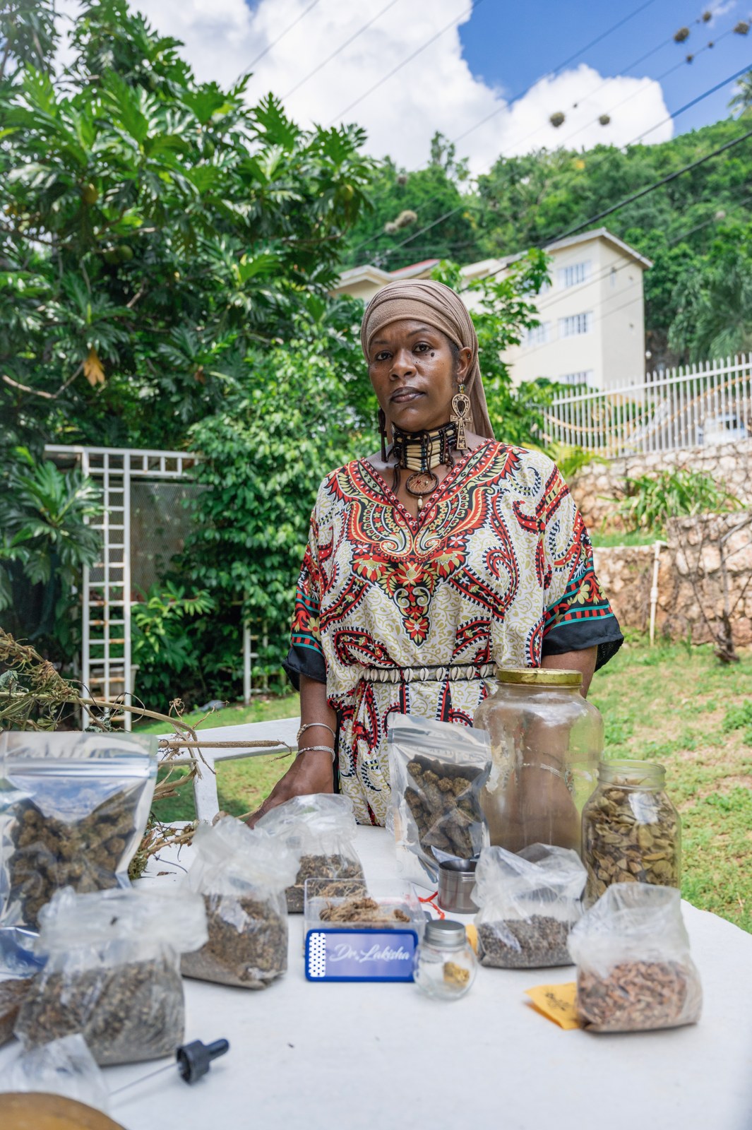 Dr. Lakisha with botanical materia medica, Jamaica