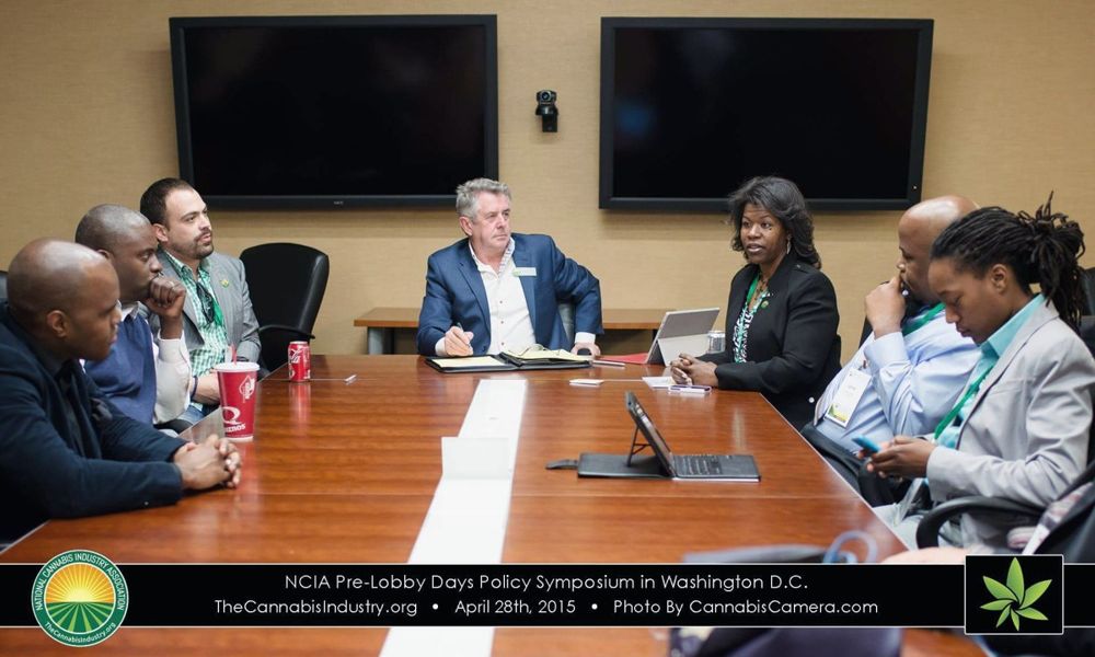 Dr. Lakisha in a policy meeting