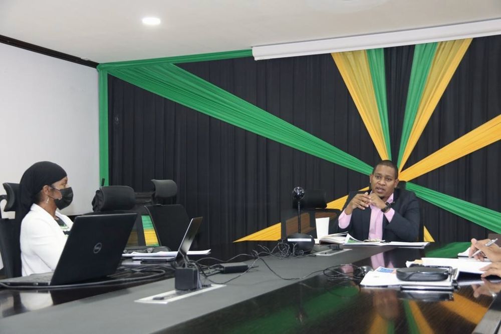 Dr. Lakisha in a meeting in Jamaica