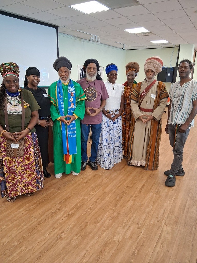 Dr. Lakisha and Hon. Priest Eueston Bailey with other attendees at the Ethiopian World Federation convention